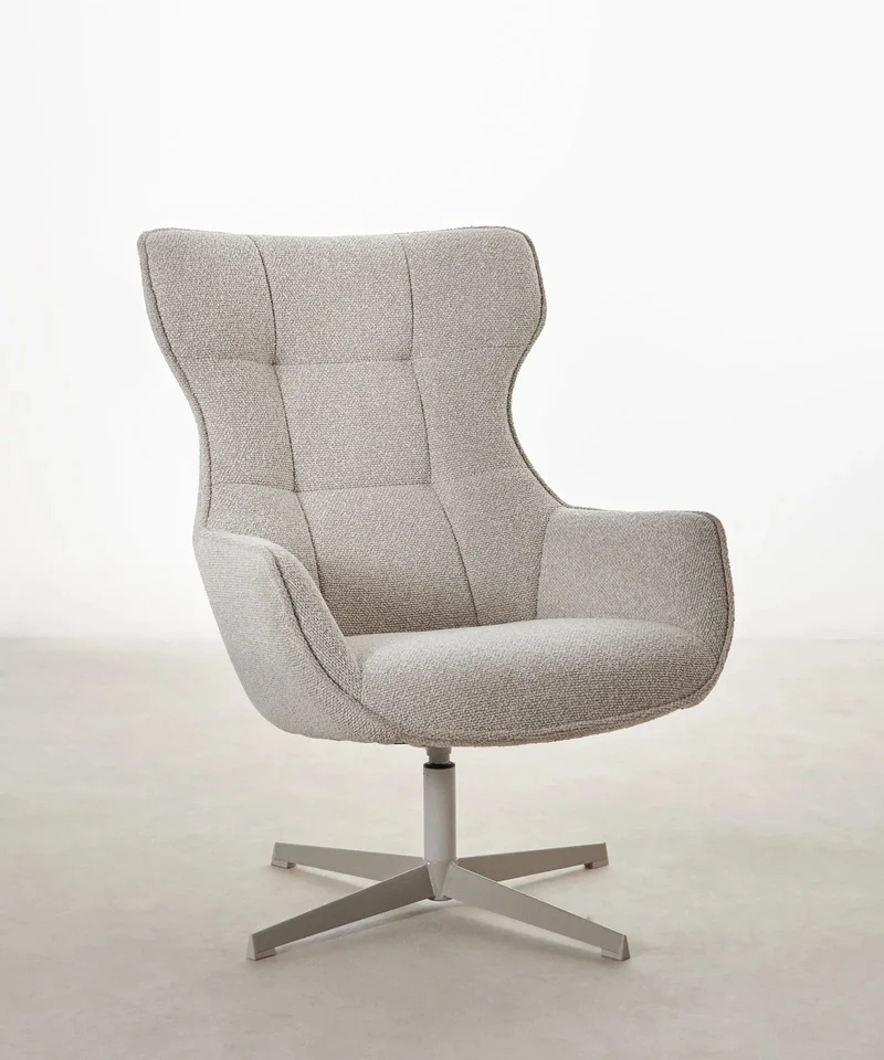 Sillón tapizado en tela bouclé Elsa